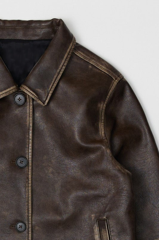 Brown leather jacket with buttons on a light gray background