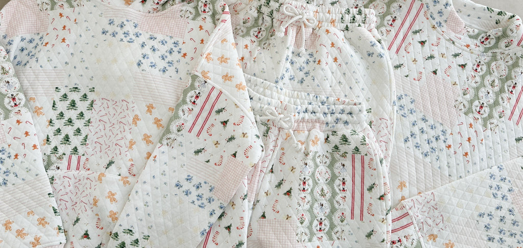 Floral quilt with intricate patterns on a neutral background