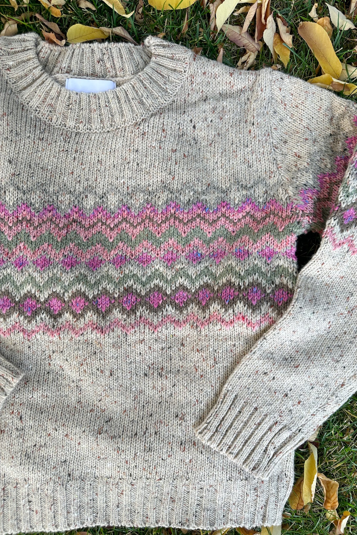The Highlands Faire Isle Knit Pullover Sweater in Pink & Oatmeal
