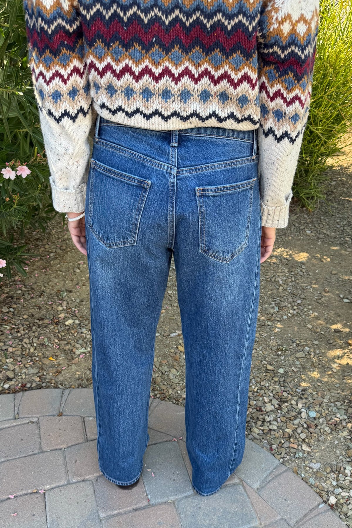Sutton Twisted High Rise Stretch Jeans in Medium Wash