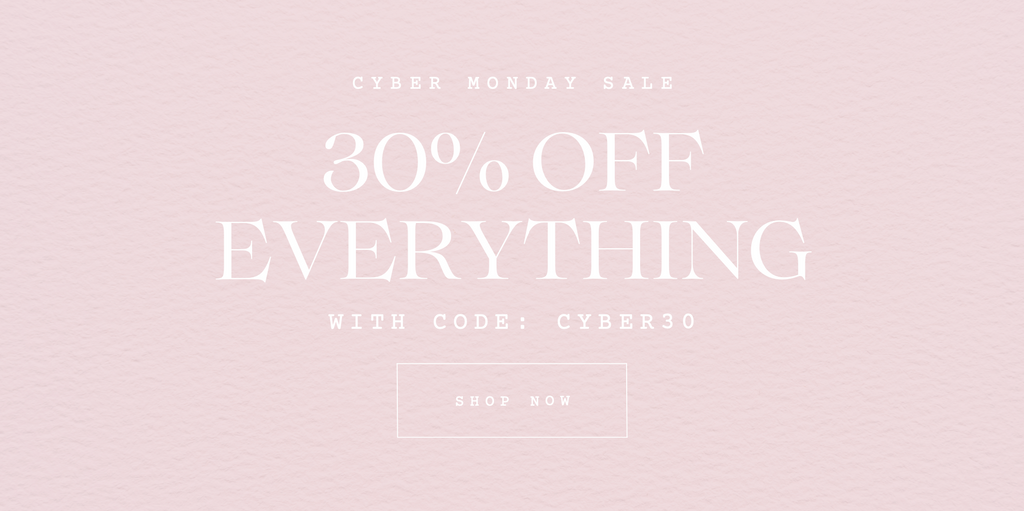 Promotional text for a Cyber Monday sale with a 30% discount on everything, on a light pink background.