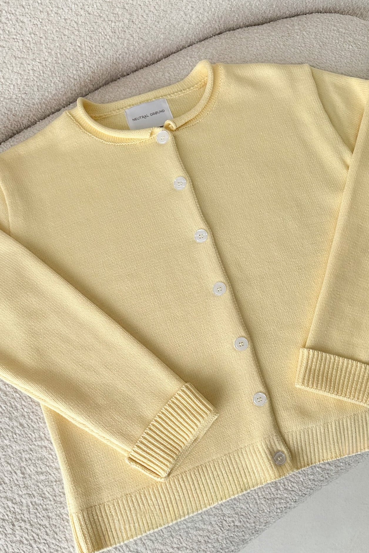 Daisy Rolled Neckline Button Up Cotton Cardigan in Sunshine - Neutral Ground